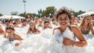 People-enjoying-a-foam-party-with-mountains-of-bubbles-surrounding-them People enjoying a foam party with mountains of bubbles surrounding them